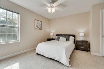 Spacious Bedroom With Ceiling Fan & Light